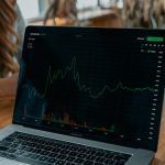 Market charts on laptop